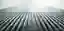 This architectural photograph showcases a modern skyscraper with a striking glass facade. The buildi