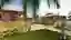 This architectural rendering showcases a tropical residential design featuring wooden bungalows with