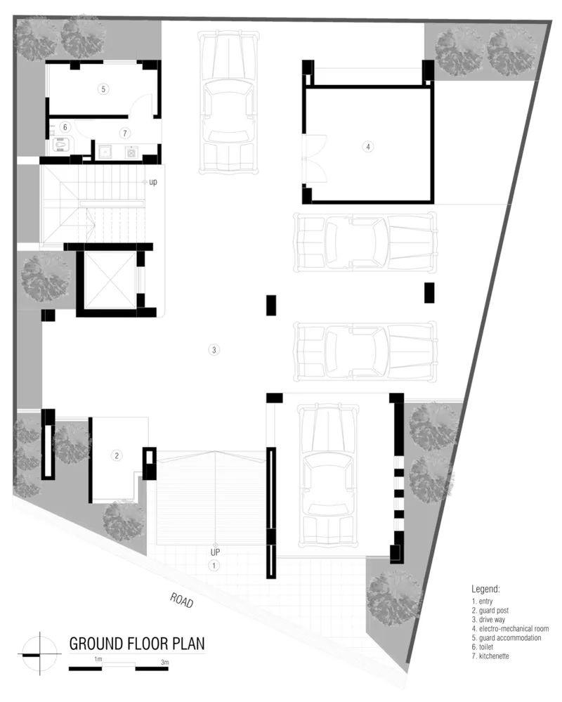 Ground floor plan showing entry lobby, drive-through parking, and service spaces with vegetation