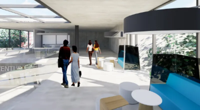 A spacious interior with open seating, fostering collaboration and natural light flow.