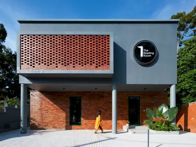 The Reading Room: A Harmonious Blend of Rustic Architecture and Community Engagement
