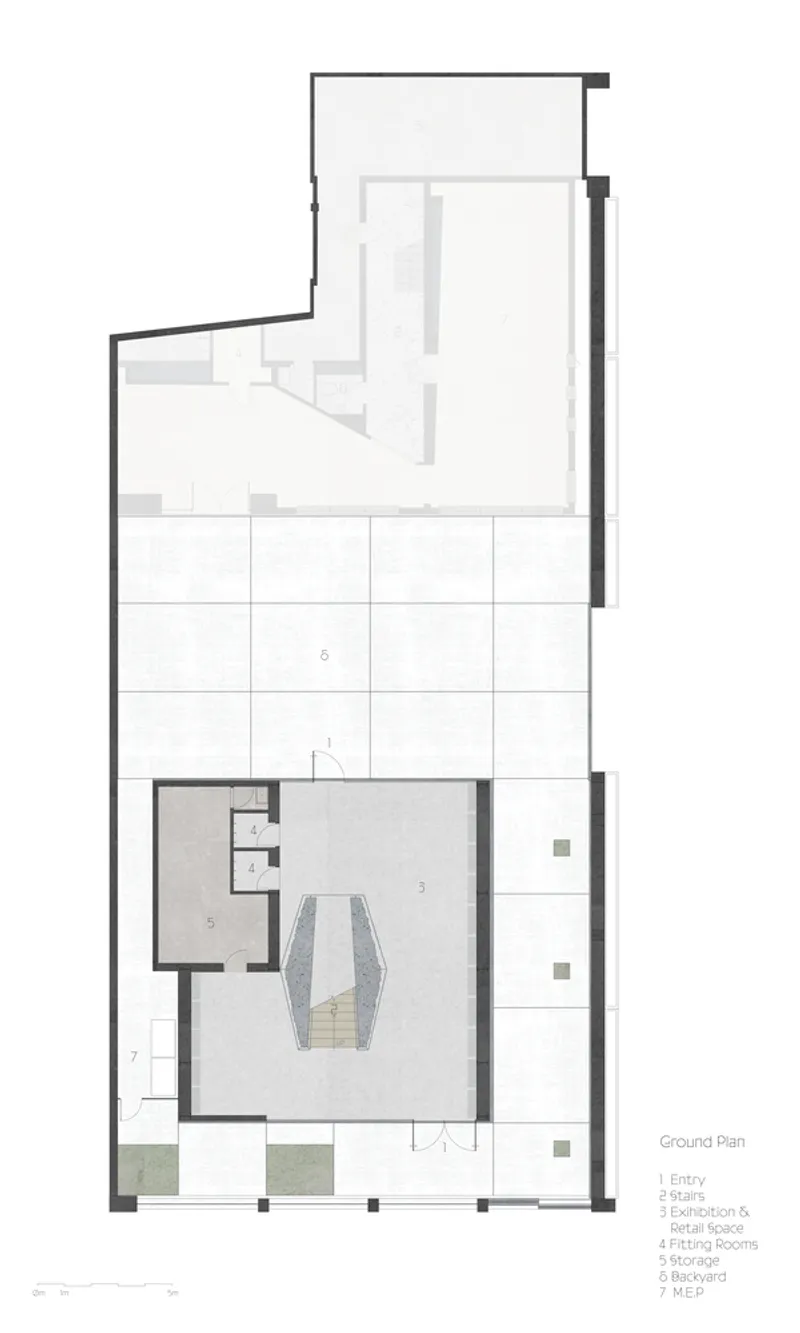 Ground floor plan: entry, central stair, exhibition and retail room, fitting rooms, storage, backyard, MEP room