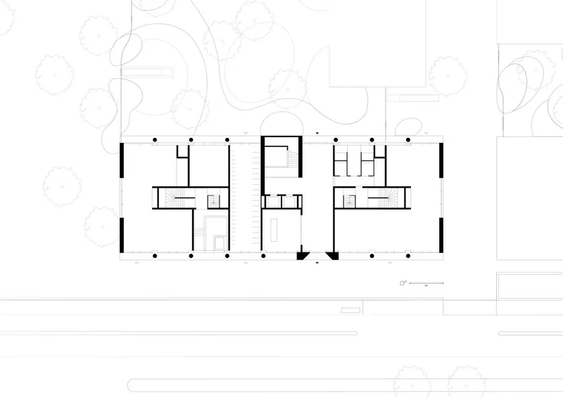 Ground floor plan drawing showing interior rooms and columns with landscape elements surrounding the building
