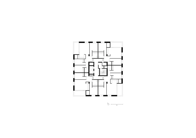 Floor plan drawing depicting multiple residential units arranged around a central stairwell
