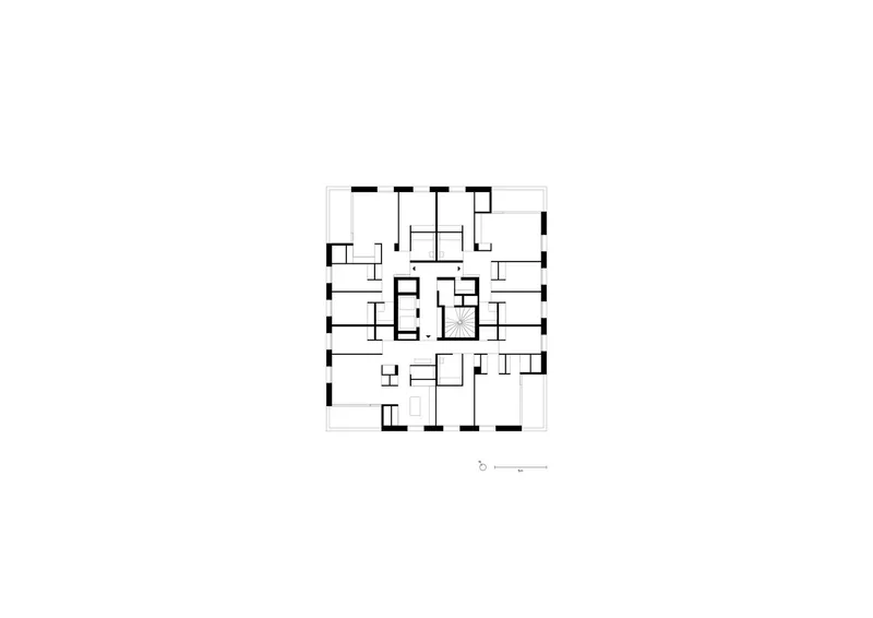 Floor plan drawing showing apartment units with central circulation core and varied room configurations