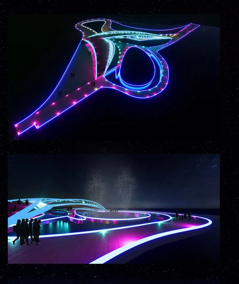 Aerial view of the illuminated three-lobed bridge structure with multicolored LED lighting and visitors below