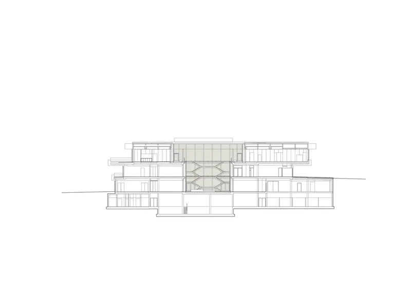 Section drawing showing central atrium space with crisscrossing diagonal structure between flanking wings