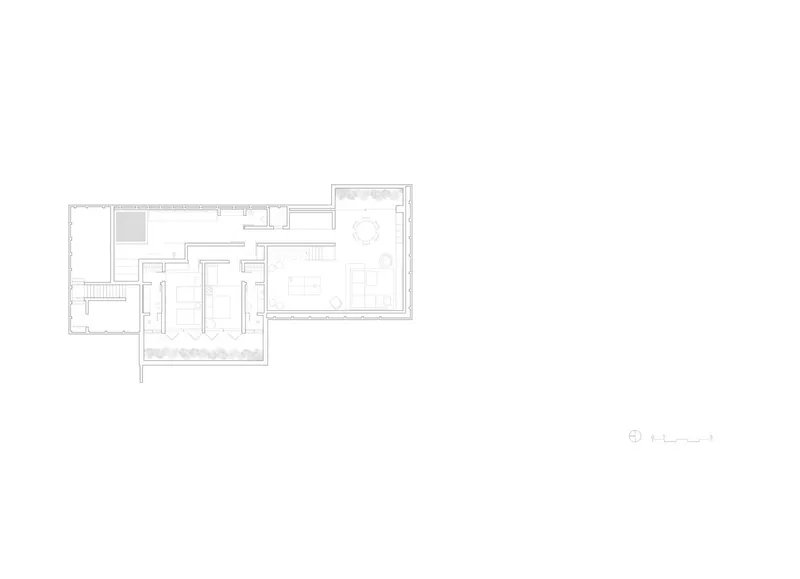 Floor plan drawing showing L-shaped layout with interior rooms and perimeter planted terraces