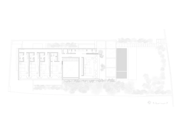 Upper floor plan drawing showing bedroom suites arranged along one wing with planted terrace
