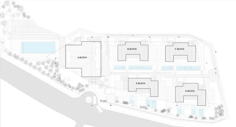 Site plan drawing showing five labeled building blocks arranged around courtyards with pool and landscaping