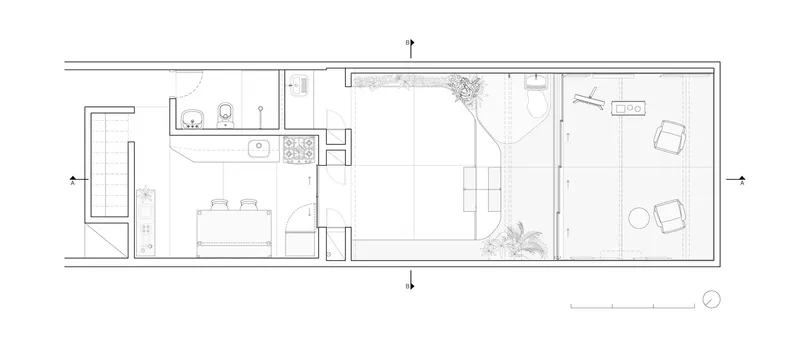 Floor plan: long narrow lot, street entry at left, kitchen and bedroom, courtyard garden, atelier at rear