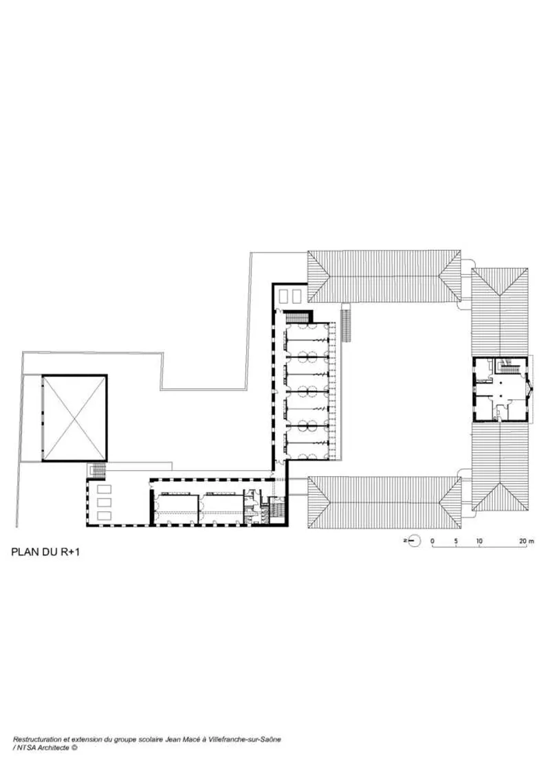 First floor plan: upper classrooms along the gallery walkway, gymnasium double-height roof, rooftop terrace
