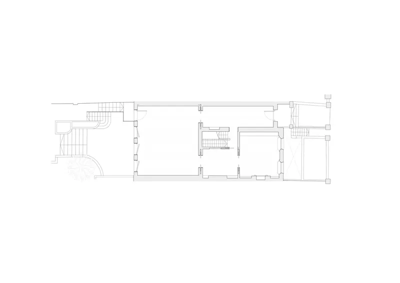 Floor plan drawing showing the upper level with central stairwell and rooms flanking both sides