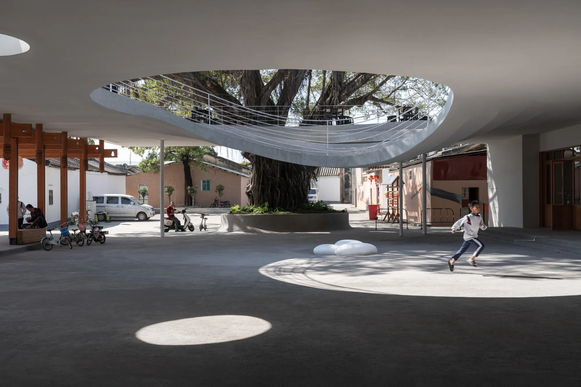 Not A Studio Wraps a Village Living Room Around a Centuries-Old Banyan Tree in Southern China