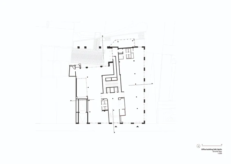 Floor plan drawing showing open office areas with central core and perimeter structural grid