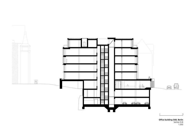 Section drawing revealing a central circulation core flanked by office floors on either side
