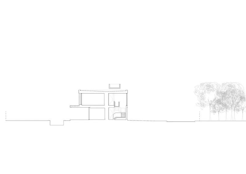 Section through stair: two-storey volume, porch overhang, reserve trees at grade