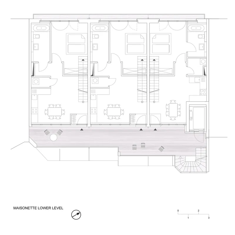 Floor plan drawing showing three residential units with shared terrace and individual staircases