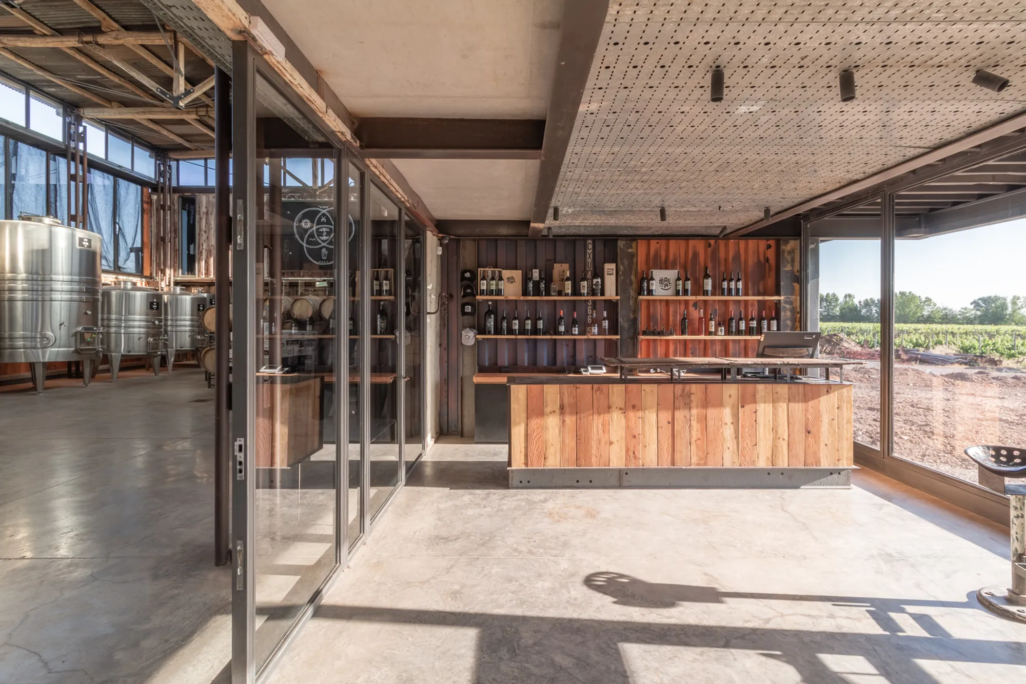 Mora Hughes Arquitectos Builds a Mendoza Winery from Shipping Containers and Reclaimed Timber