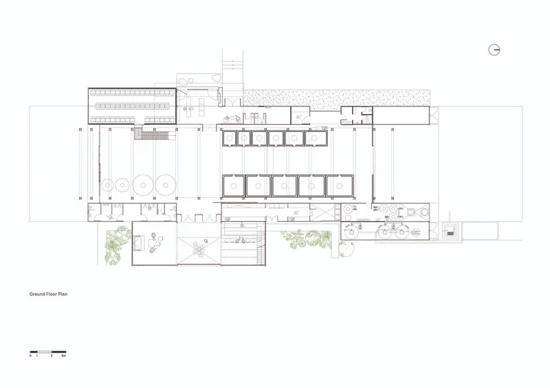 Ground floor plan drawing showing linear arrangement of spaces with courtyard plantings