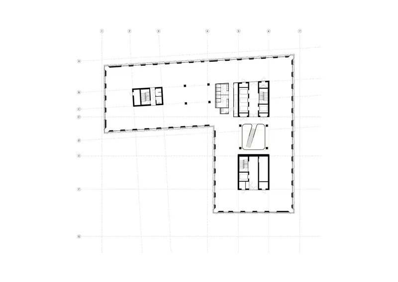 Second floor plan showing two open office areas separated by a central core with stairs