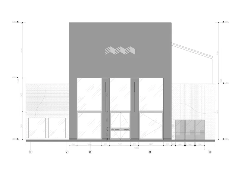 Front elevation: white cubic entry volume with three openings and wavy logo, flanked by the lower brick wings