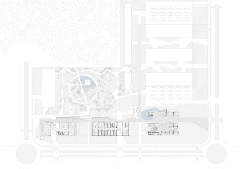 Site plan drawing showing multiple rectangular volumes around a central circular courtyard with trees