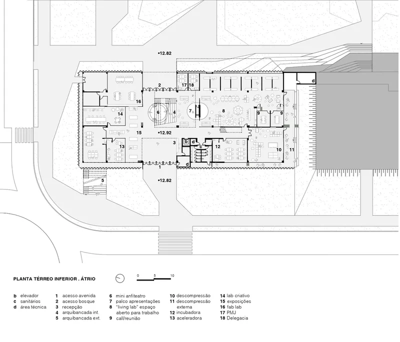 Ground floor plan drawing showing a rectangular layout with labeled rooms and a central atrium