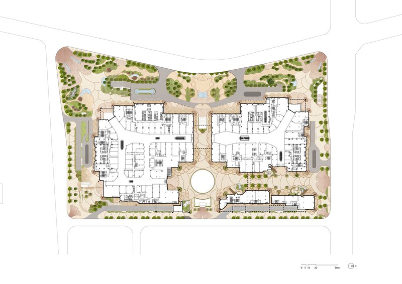 Site plan drawing showing building footprints with a central circular courtyard surrounded by tree clusters and water features