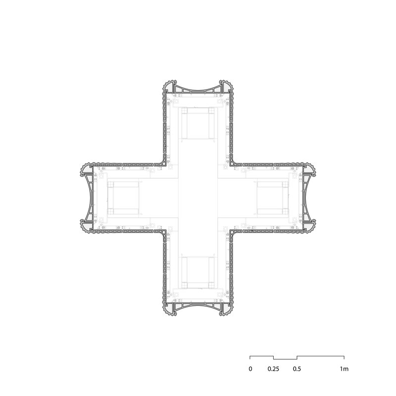 Floor plan drawing depicting the cross-shaped configuration with rooms arranged in each of the four wings