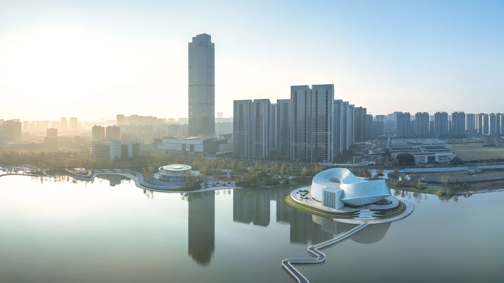 Aedas Sets Three Ribbed Domes on a Lake Island to Create the Yohoo Museum