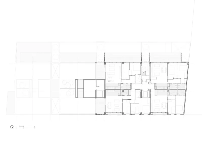 Top floor plan: further setback reducing the footprint, large private terraces, three dwelling units
