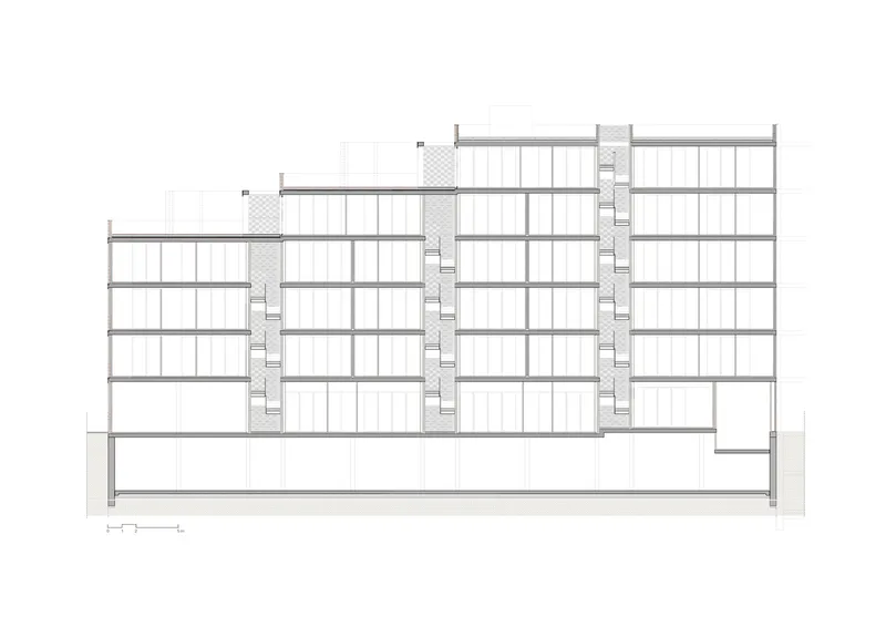 Longitudinal section: five upper levels with deep balconies, perforated facade screen, basement level below, two stair cores