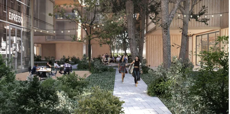 Ground-level courtyard with an espresso cafe, string lights, mature trees, dense planting, and residents walking along a shared path