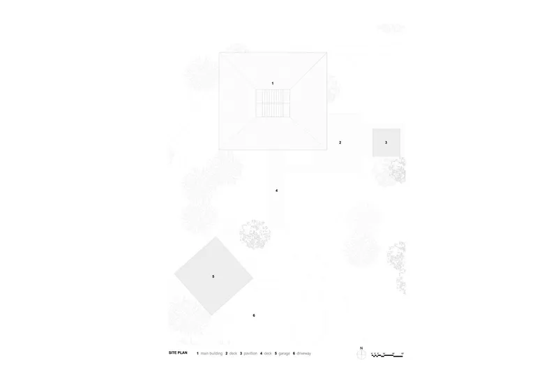 Site plan drawing showing multiple building volumes dispersed among tree canopy outlines