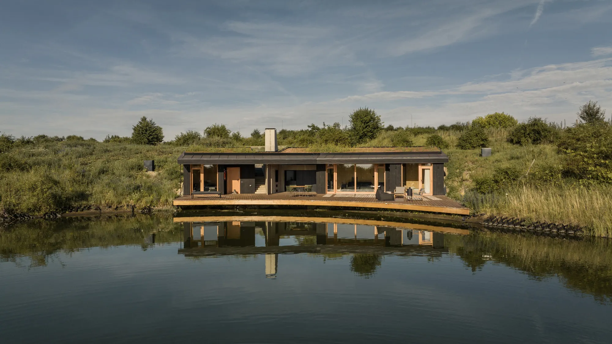 CLT House: A Green-Roofed Retreat in Hungary