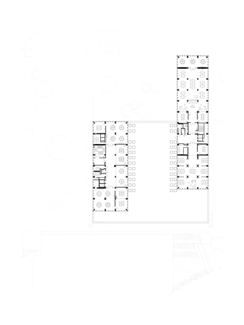 Ground floor plan drawing showing L-shaped layout with central courtyard and vertical residential tower