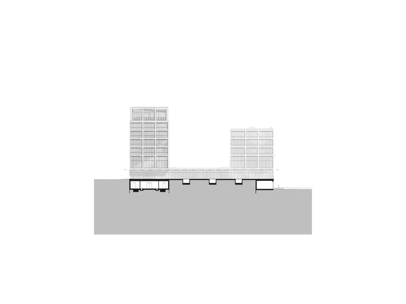 Elevation drawing showing two residential towers rising above a shared podium base