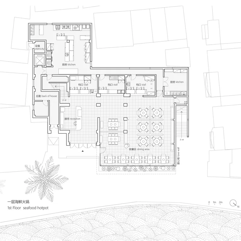 First floor plan drawing showing reception areas, dining hall, and multiple kitchens radiating from a central courtyard