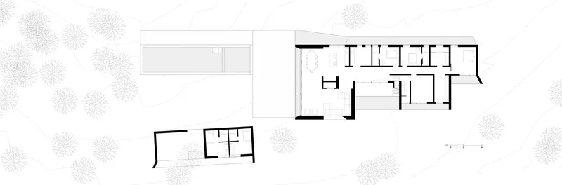 Floor plan drawing showing three rectangular volumes arranged around a courtyard with scattered trees