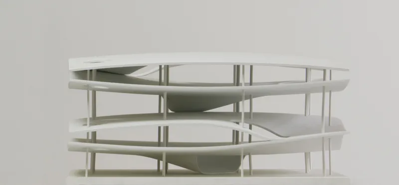 Frontal view of physical model revealing interlocking floor plates between vertical support structure