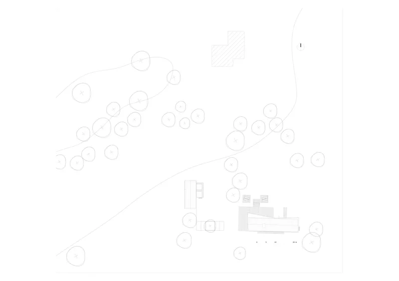 Site plan drawing showing building footprint among scattered circular tree canopies and topographic contours