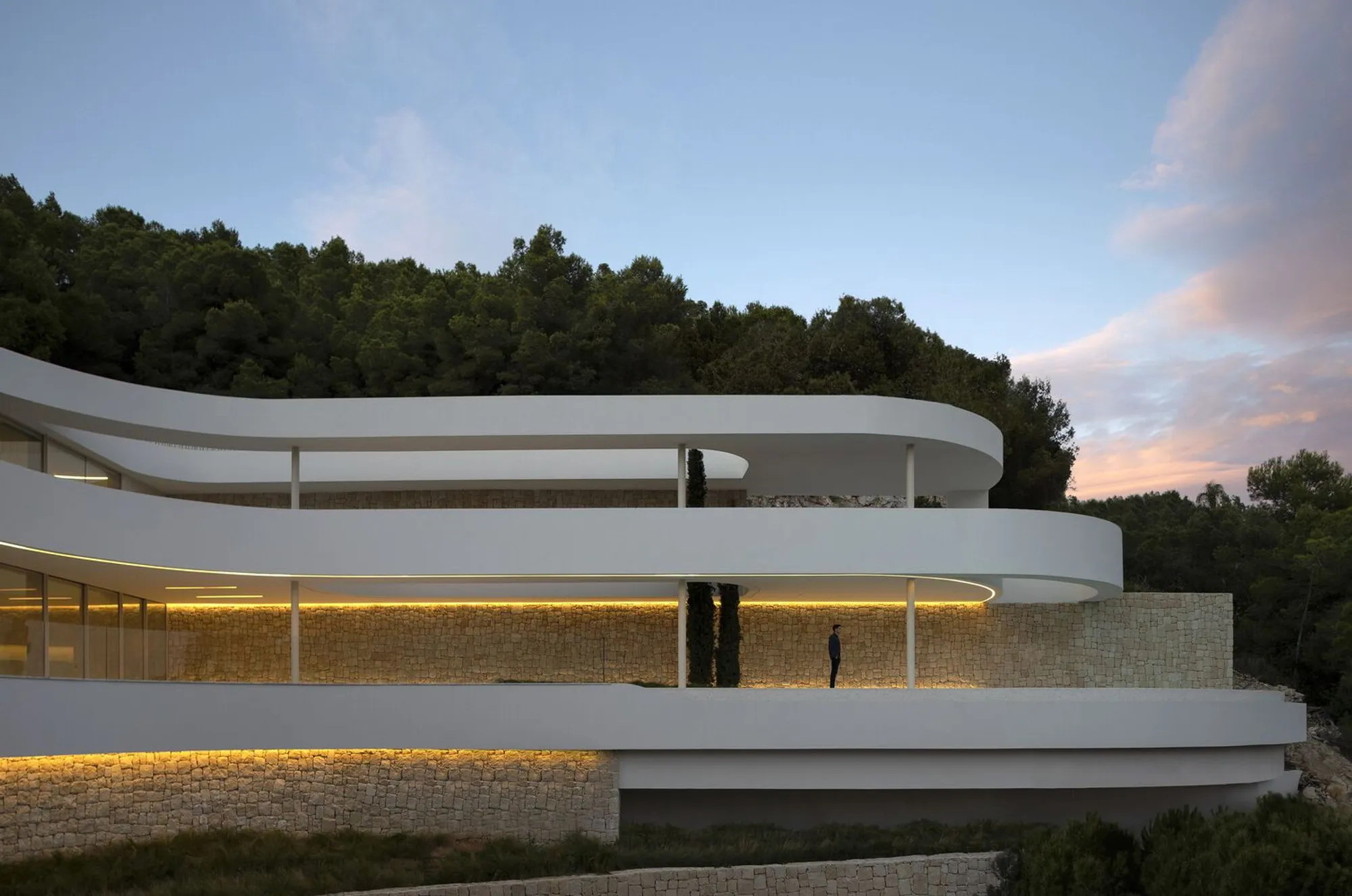 Pepe Giner Arquitectos Sculpts a Cascading White Villa into Spain's Coastal Hillside