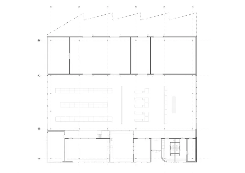 Floor plan drawing showing large open hall space with rows of seating and support rooms