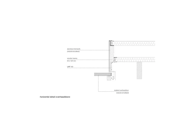 Construction detail of overhead door system with timber framework and folded metal flashing