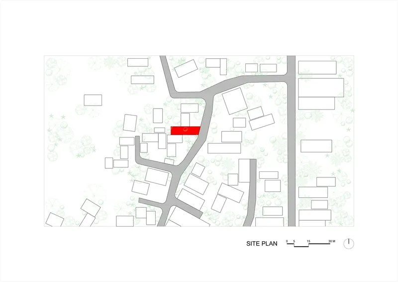 Site plan drawing showing a single volume highlighted in red among surrounding buildings and curving roads