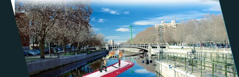 Angled red and blue stage platform along a canal promenade with bare winter trees