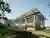 Andrade Morettin Lifts a Timber-Framed House Above the Brazilian Countryside on Solar Canopies