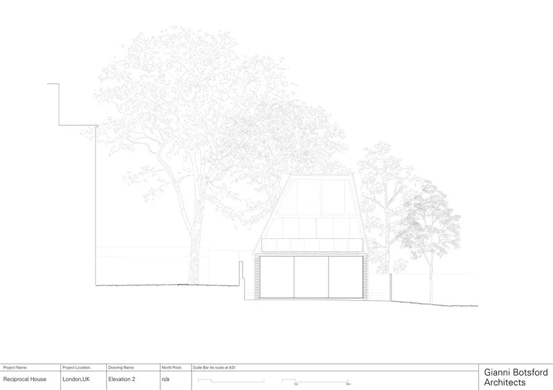 Garden elevation with the A-frame and mature trees.