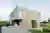 Impepinable Studio Fuses a Gym and a House into One Playful Concrete Block Volume
